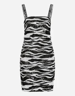 Short sequined dress with draping