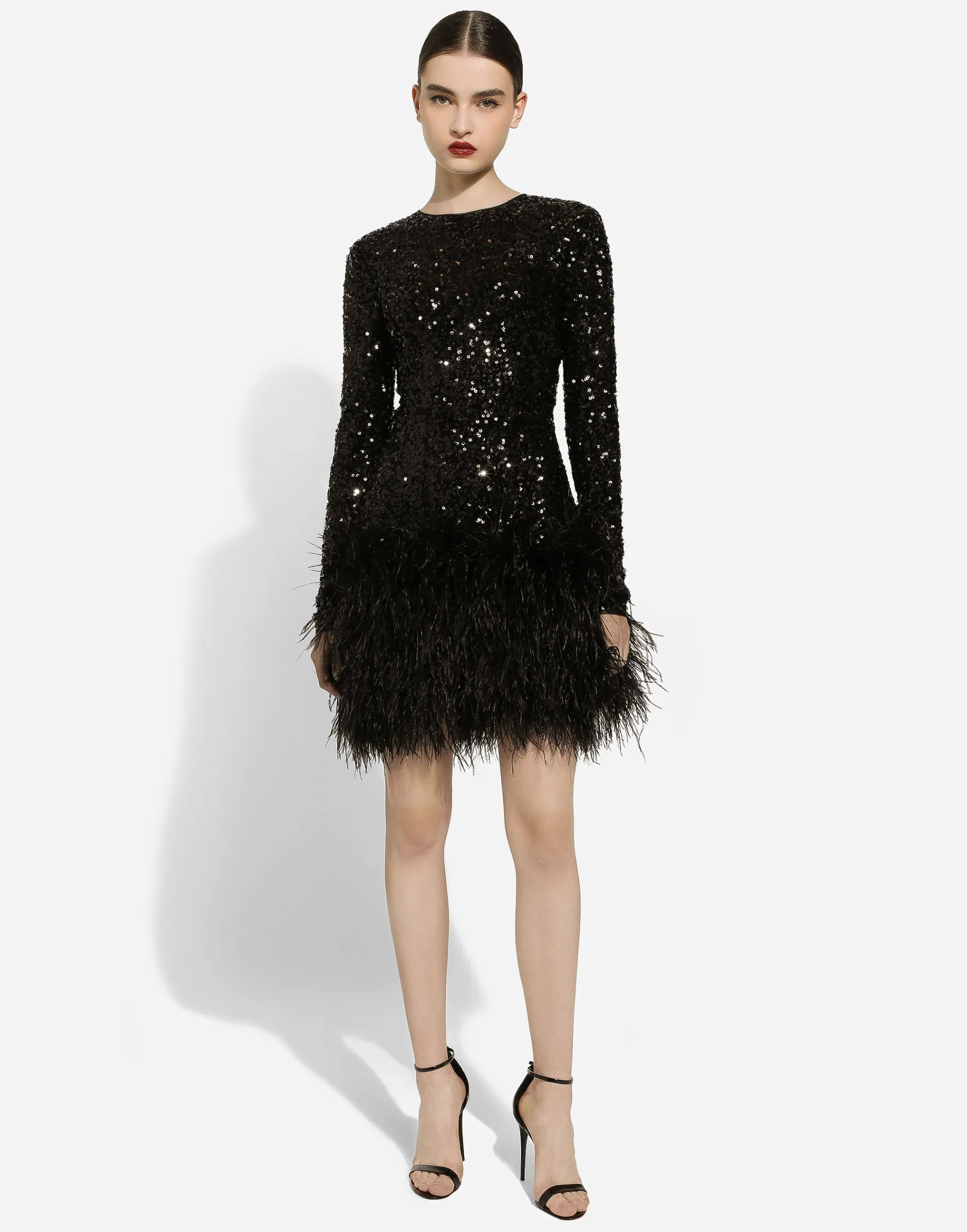 Short sequined dress with feather trim