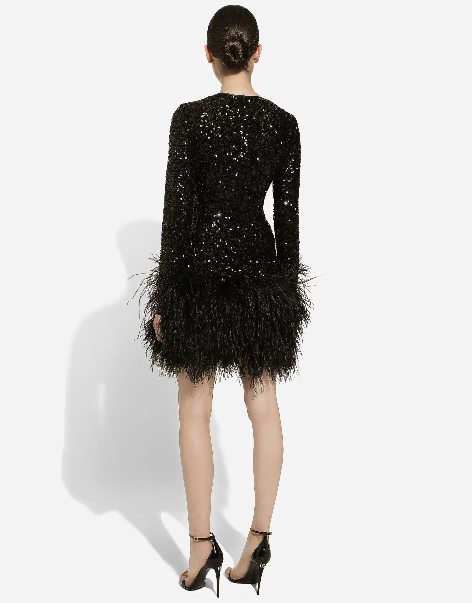 Short sequined dress with feather trim