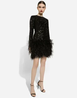 Short sequined dress with feather trim