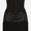 Short skirt with corset belt detail