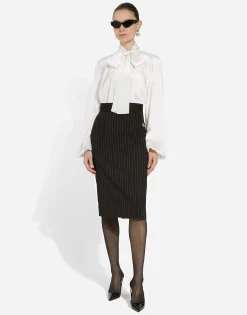 Short straight-cut pinstripe wool skirt