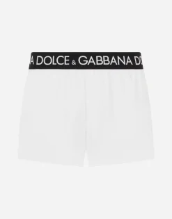Short swim trunks with branded stretch waistband