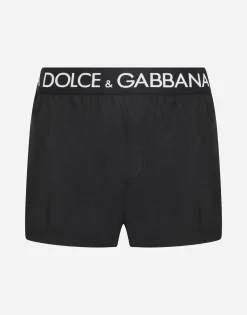 Short swim trunks with branded stretch waistband