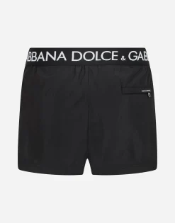 Short swim trunks with branded stretch waistband