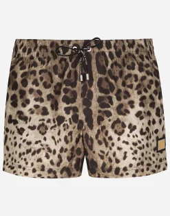 Short swim trunks with leopard print