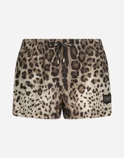 Short swim trunks with leopard print
