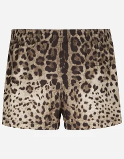 Short swim trunks with leopard print