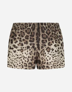 Short swim trunks with leopard print