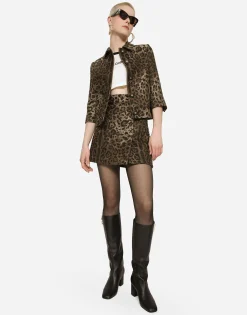 Short wool skirt with jacquard leopard design