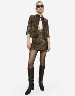 Short wool skirt with jacquard leopard design