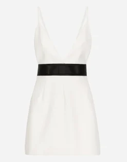 Short woolen dress with satin belt and straps