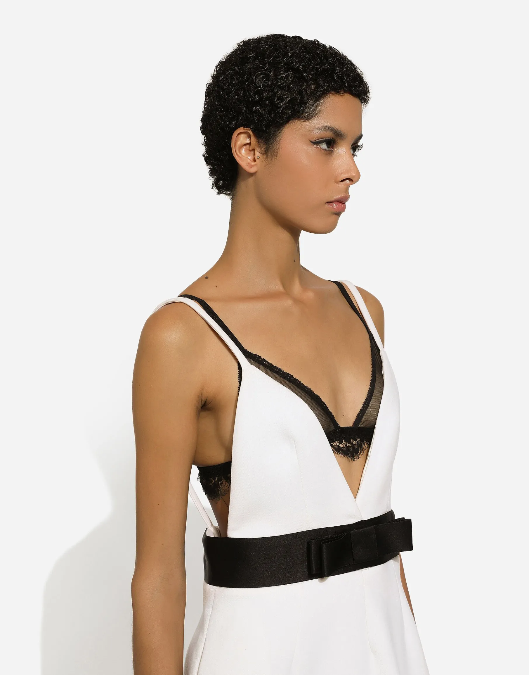 Short woolen dress with satin belt and straps