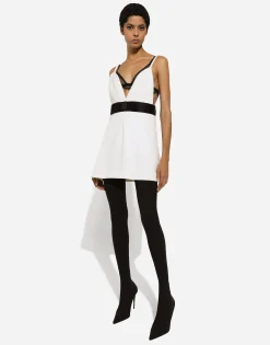 Short woolen dress with satin belt and straps