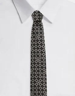 Silk jacquard tie with DG logo