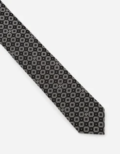 Silk jacquard tie with DG logo