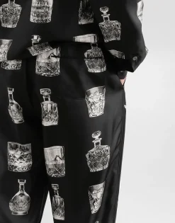 Silk pajama pants with whisky print