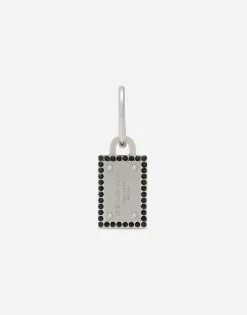 Single Creole earring with logo tag and rhinestones