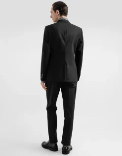 Single-breasted wool Martini-fit suit with heraldic emblem
