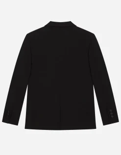 Single-breasted woolen jacket with duchesse inserts