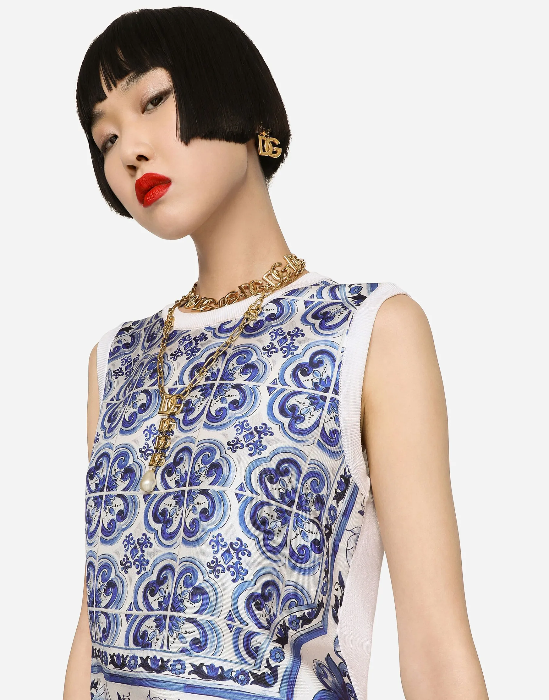 Sleeveless silk and twill sweater with majolica print