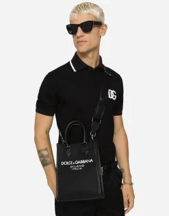 Small nylon bag with rubberized logo