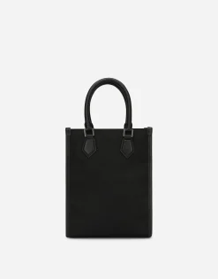 Small nylon bag with rubberized logo
