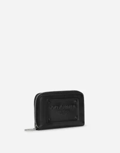 Small zip-around wallet in calfskin with raised logo