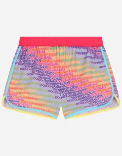Spandex swim shorts with all-over logo print