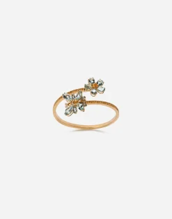 Spring yellow gold bracelet with butterfly-shaped settings and floral decoration