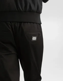 Stretch cotton jogging pants with tag
