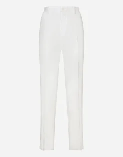 Stretch cotton pants with branded tag