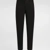 Stretch cotton pants with branded tag