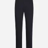 Stretch cotton pants with branded tag