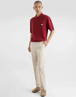 Stretch cotton pants with branded tag