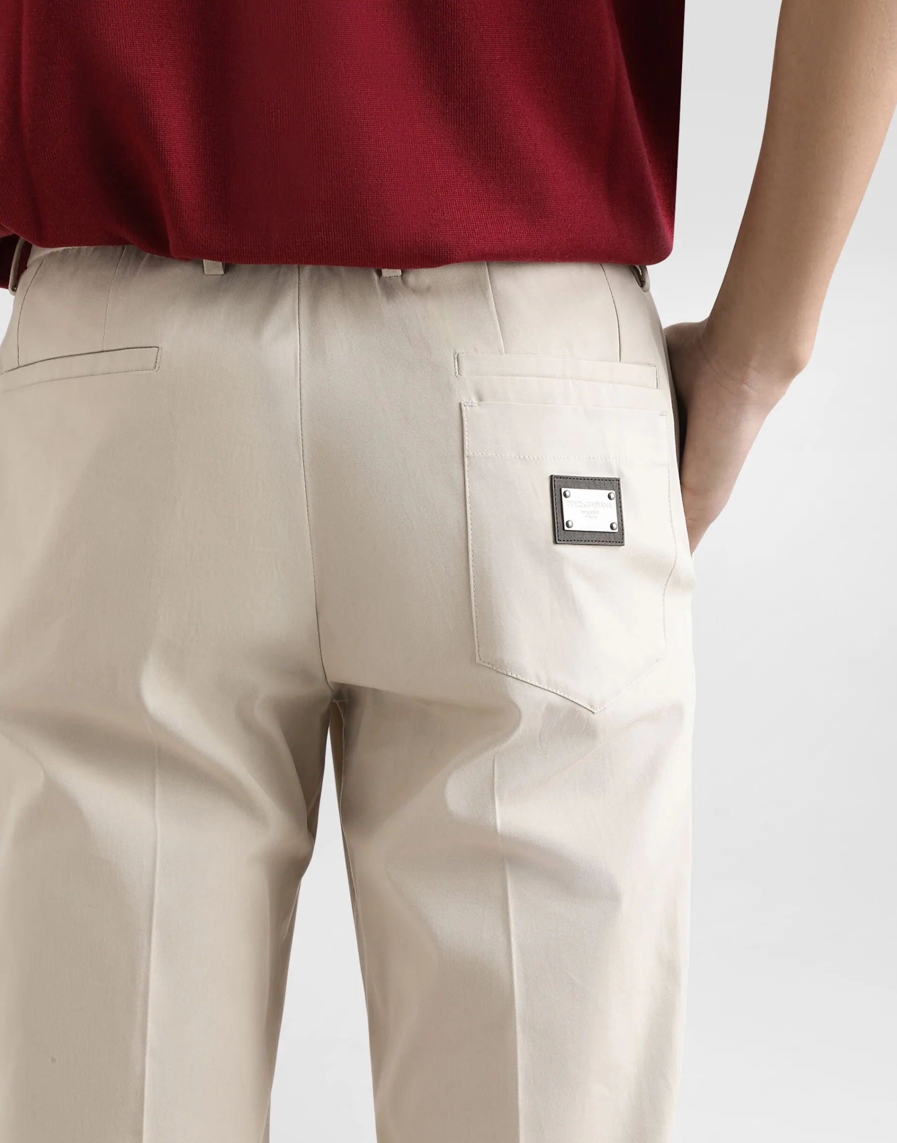 Stretch cotton pants with branded tag