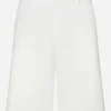 Stretch cotton shorts with branded tag