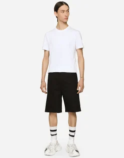 Stretch cotton shorts with branded tag