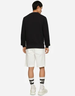 Stretch cotton shorts with branded tag