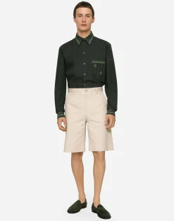 Stretch cotton shorts with branded tag