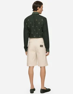 Stretch cotton shorts with branded tag