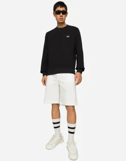 Stretch cotton shorts with branded tag