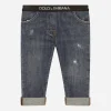 Stretch denim jeans with branded elastic