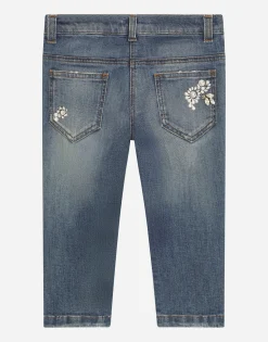Stretch denim jeans with bejeweled embellishment