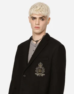 Stretch jersey jacket with heraldic patch