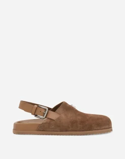 Suede mules with logo tag