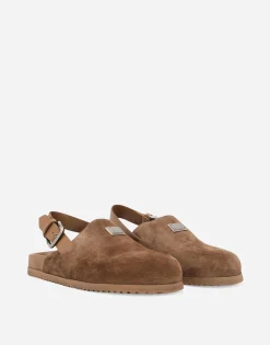 Suede mules with logo tag