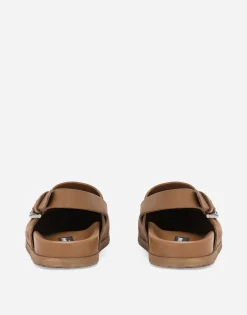 Suede mules with logo tag