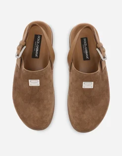Suede mules with logo tag