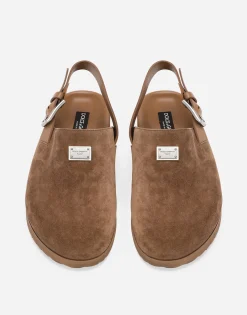 Suede mules with logo tag